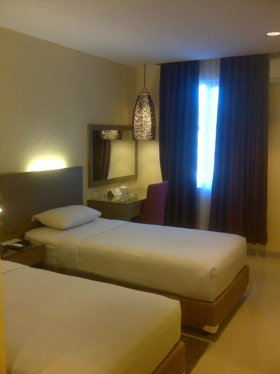 Amans Hotel Ambon Cameră foto